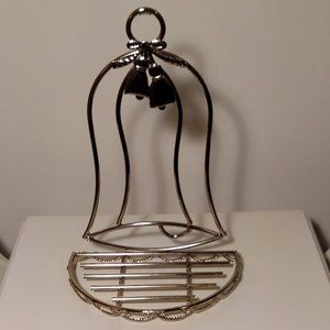 Bell shaped, gold tone metal, semi-circle shelf in excellent condition